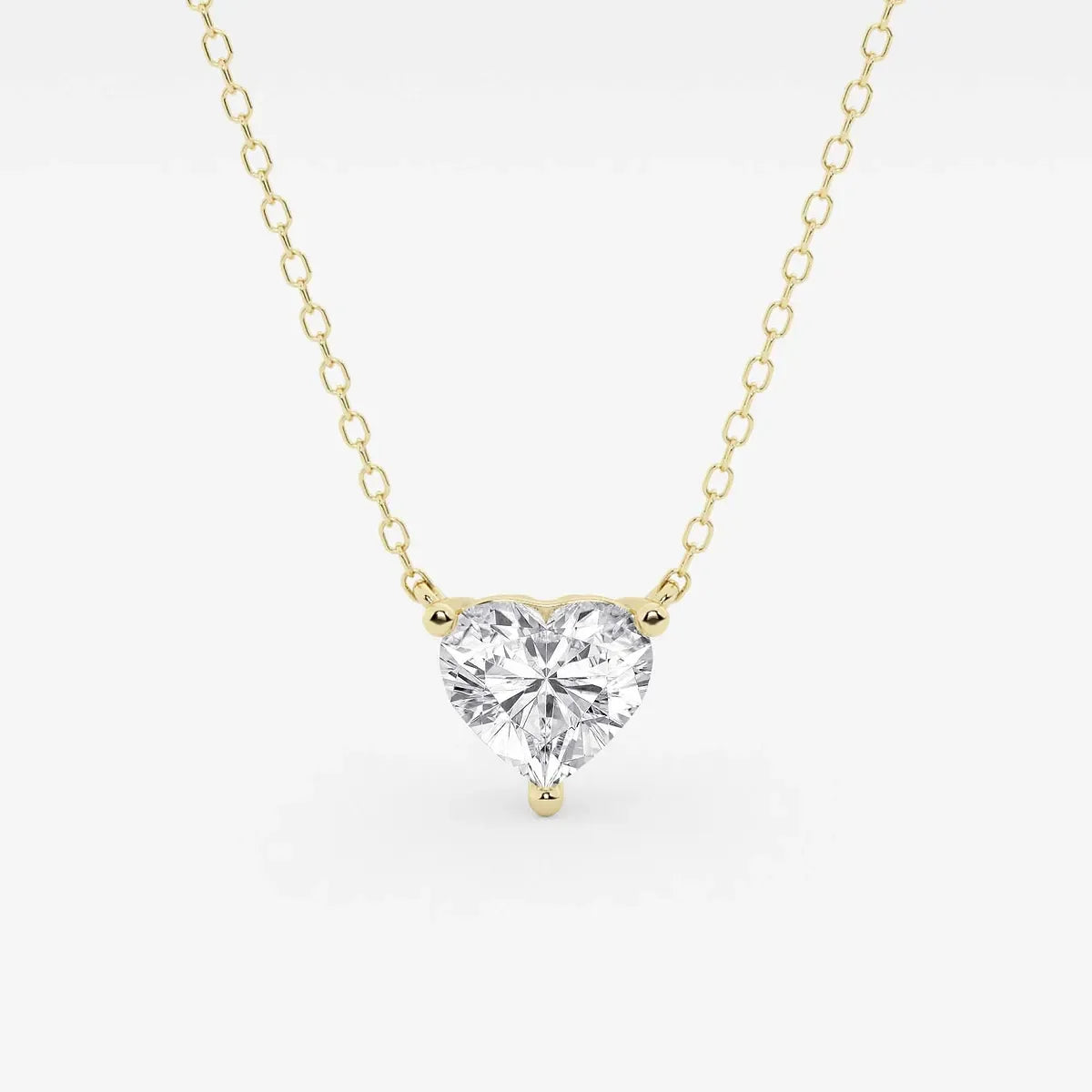 Heart-shaped lab grown diamond pendant on yellow gold chain, Delux Jewelry