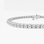 Lab grown diamond tennis bracelet in white gold by Delux Jewelry on white background