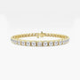 Yellow gold tennis bracelet with round lab grown diamonds from Delux Jewelry
