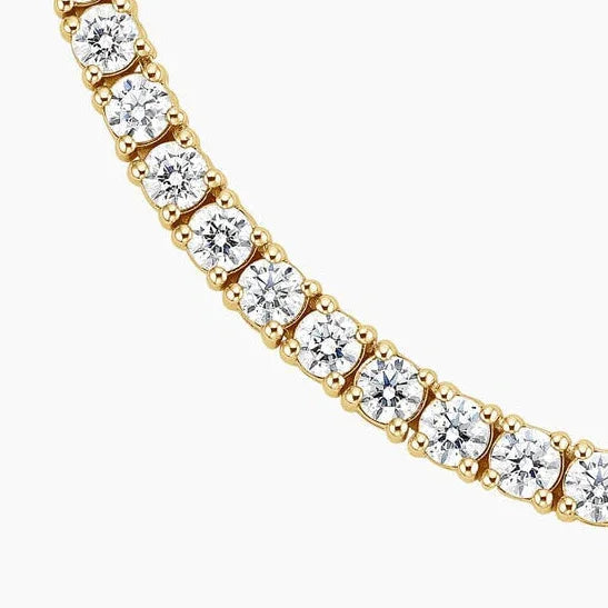 Close-up of 18 inch lab diamond tennis necklace in 14K yellow gold from Delux Jewelry
