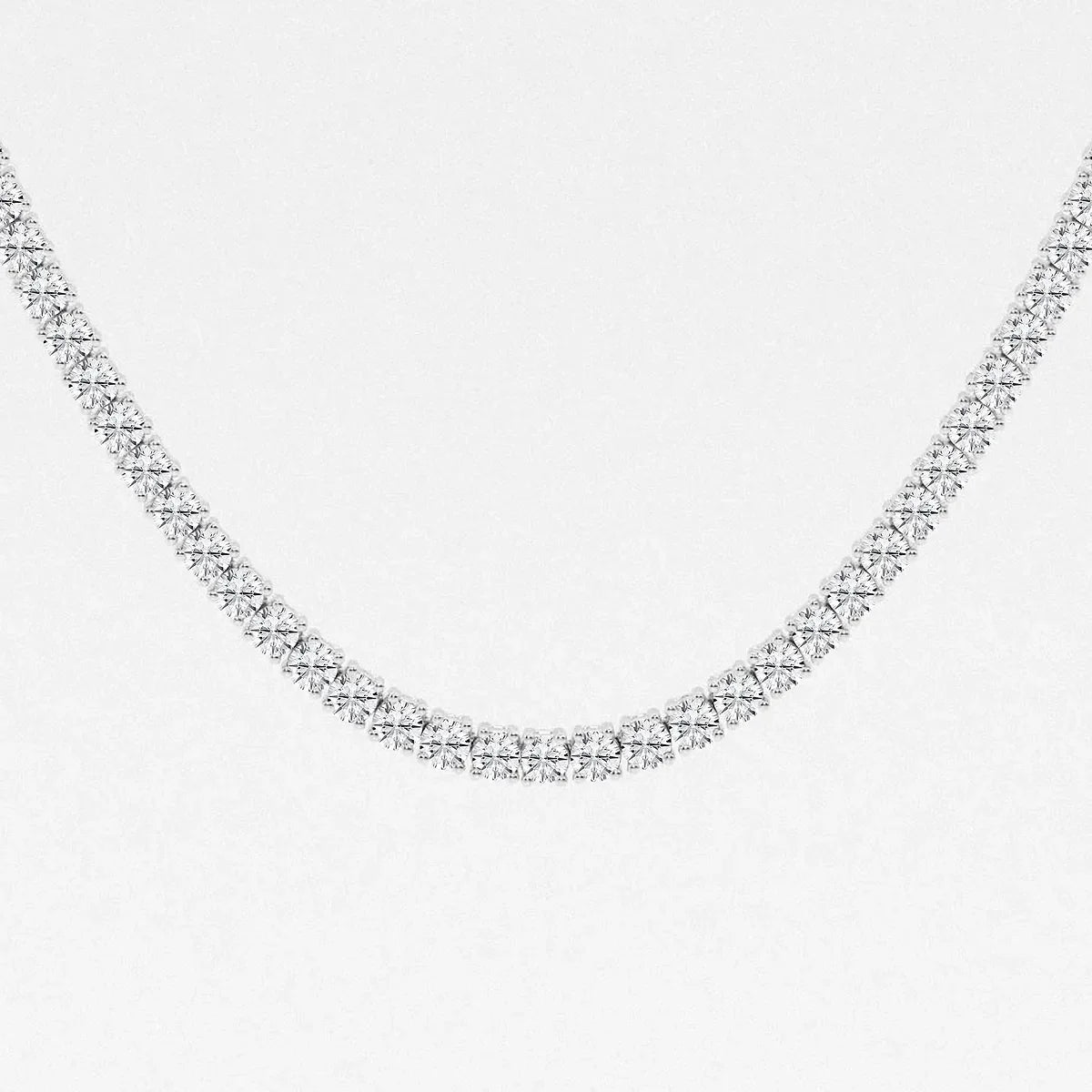 Close-up of a 14K white gold lab grown diamond tennis necklace from Delux Jewelry