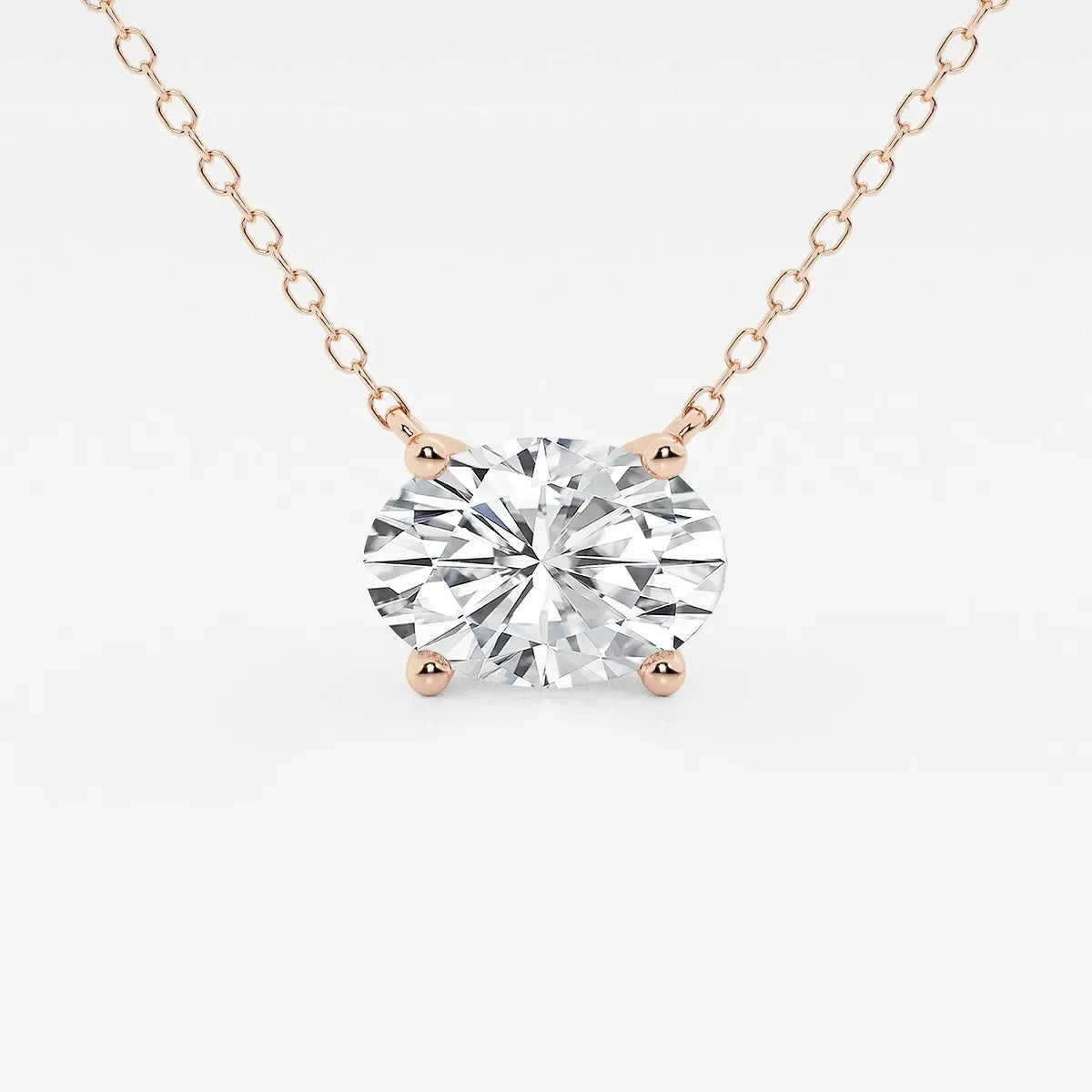 Oval lab grown diamond pendant on a rose gold chain, Delux Jewelry fine jewelry product