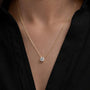 Gold chain necklace with round lab grown diamond pendant from Delux Jewelry