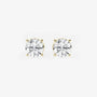 Round lab grown diamond stud earrings with yellow gold prongs on white background, Delux Jewelry