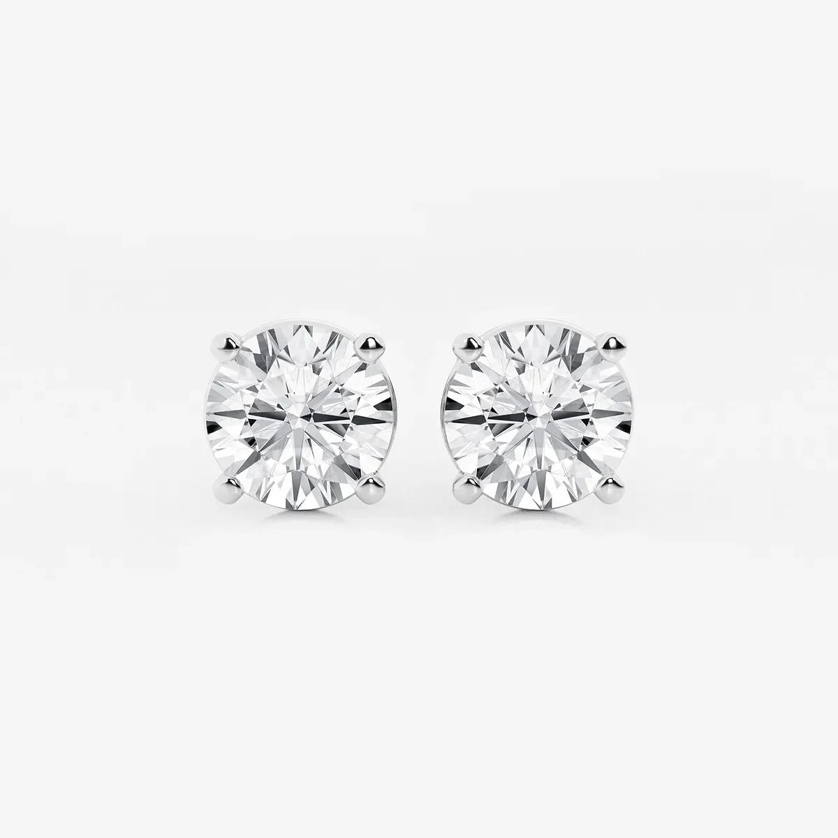 Round lab grown diamond stud earrings in white gold setting, Delux Jewelry