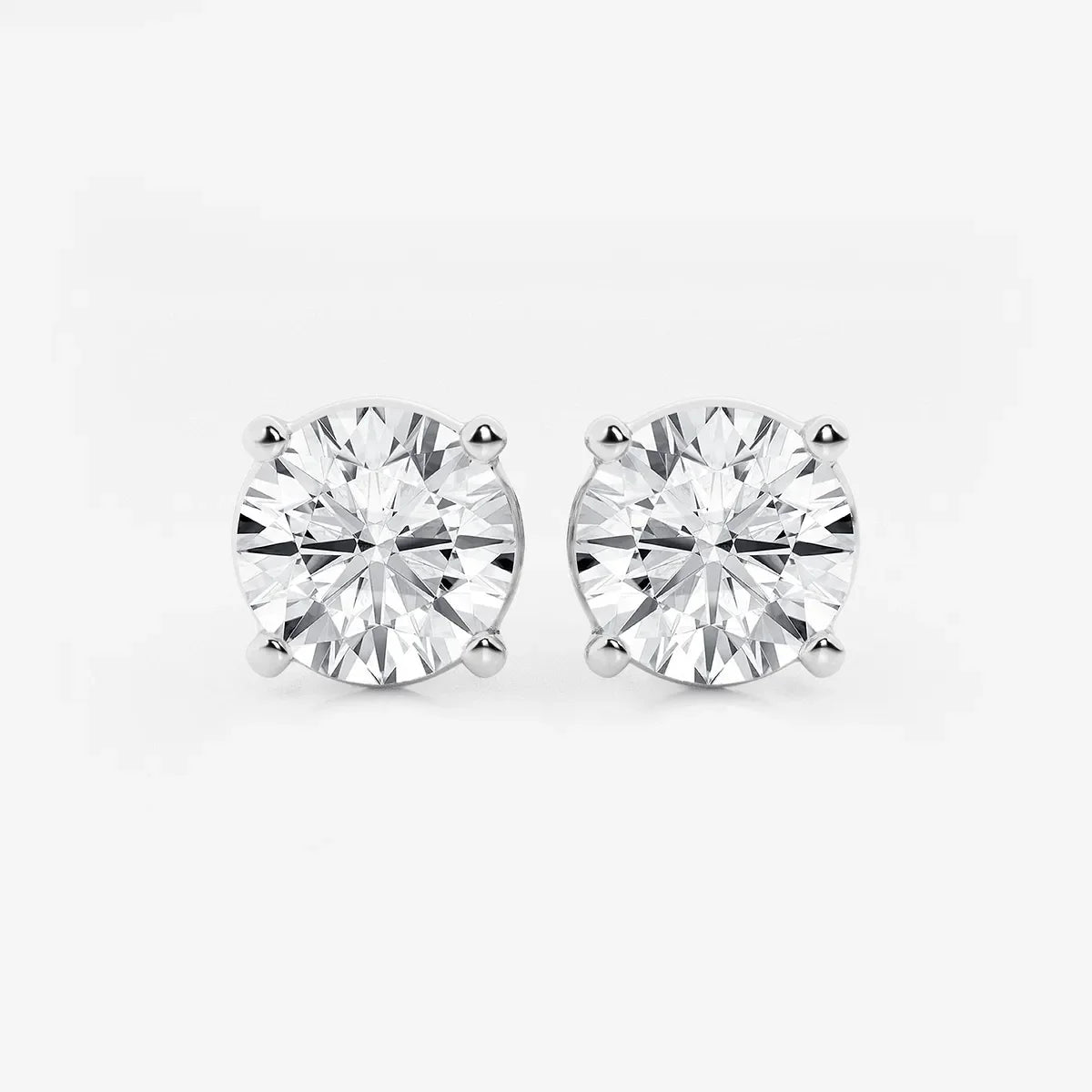 Round lab grown diamond stud earrings in prong setting, Delux Jewelry