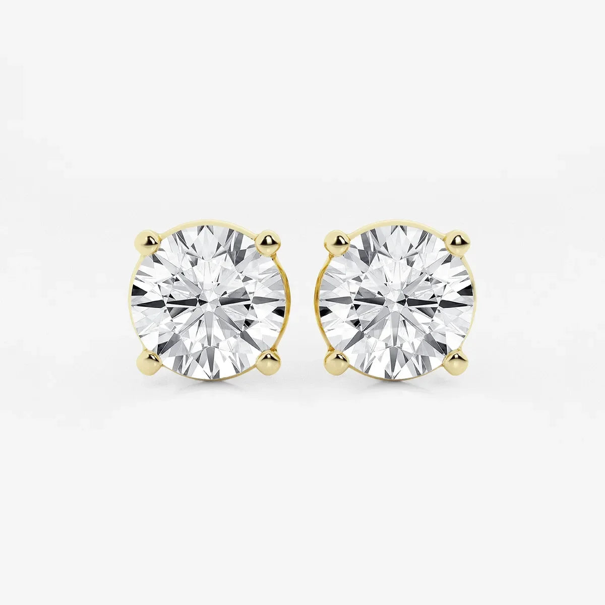 Round lab grown diamond stud earrings in yellow gold setting, Delux Jewelry