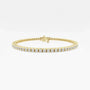 Yellow gold tennis bracelet with lab grown diamonds by Delux Jewelry on white background