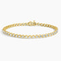 7 inch lab diamond tennis bracelet in 14K yellow gold from Delux Jewelry on white background