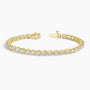 14K yellow gold lab grown diamond tennis bracelet with open clasp on white background