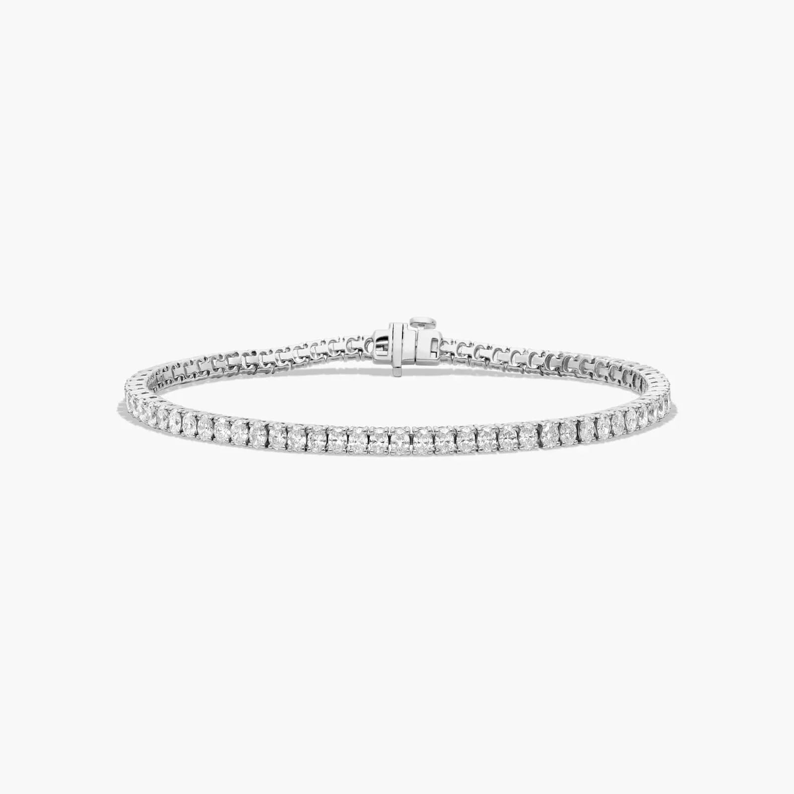 7 inch lab diamond tennis bracelet in 14K white gold with oval cut stones, Delux Jewelry