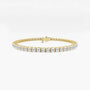 Yellow gold lab grown diamond tennis bracelet on white background, Delux Jewelry