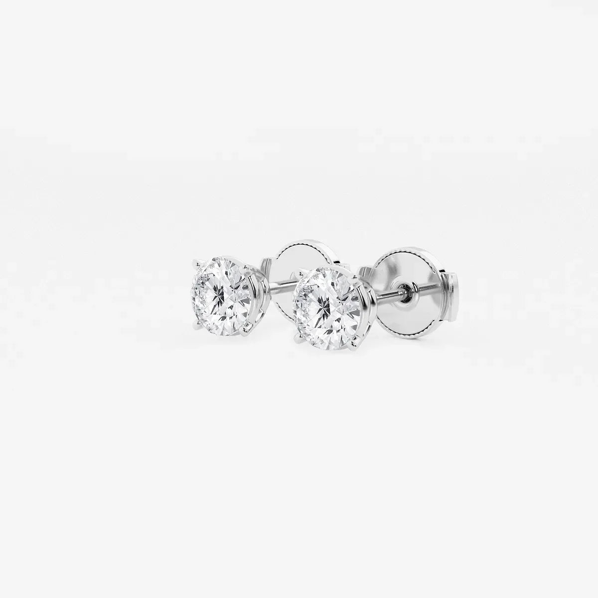 Round lab grown diamond stud earrings in white gold setting from Delux Jewelry