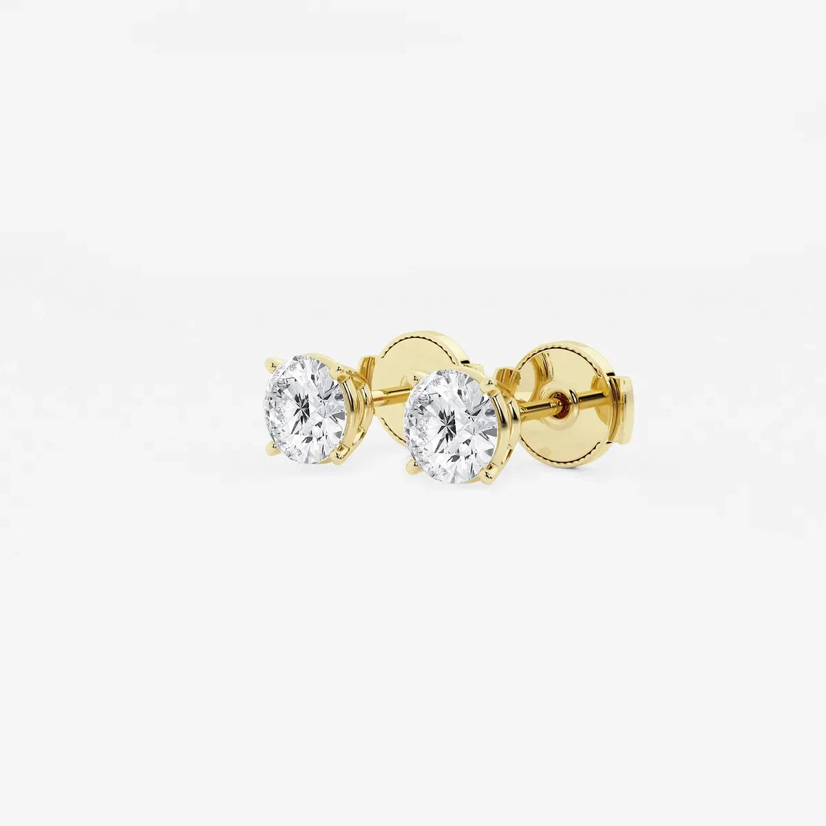Round lab grown diamond stud earrings in yellow gold by Delux Jewelry