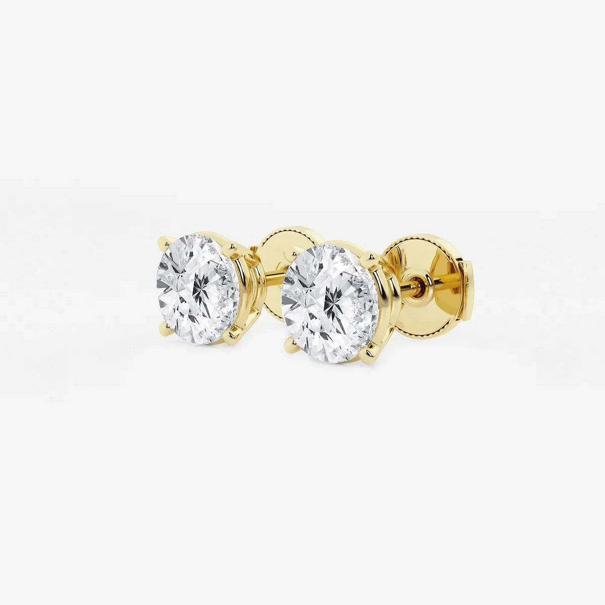 Gold stud earrings with round lab grown diamonds from Delux Jewelry on white background