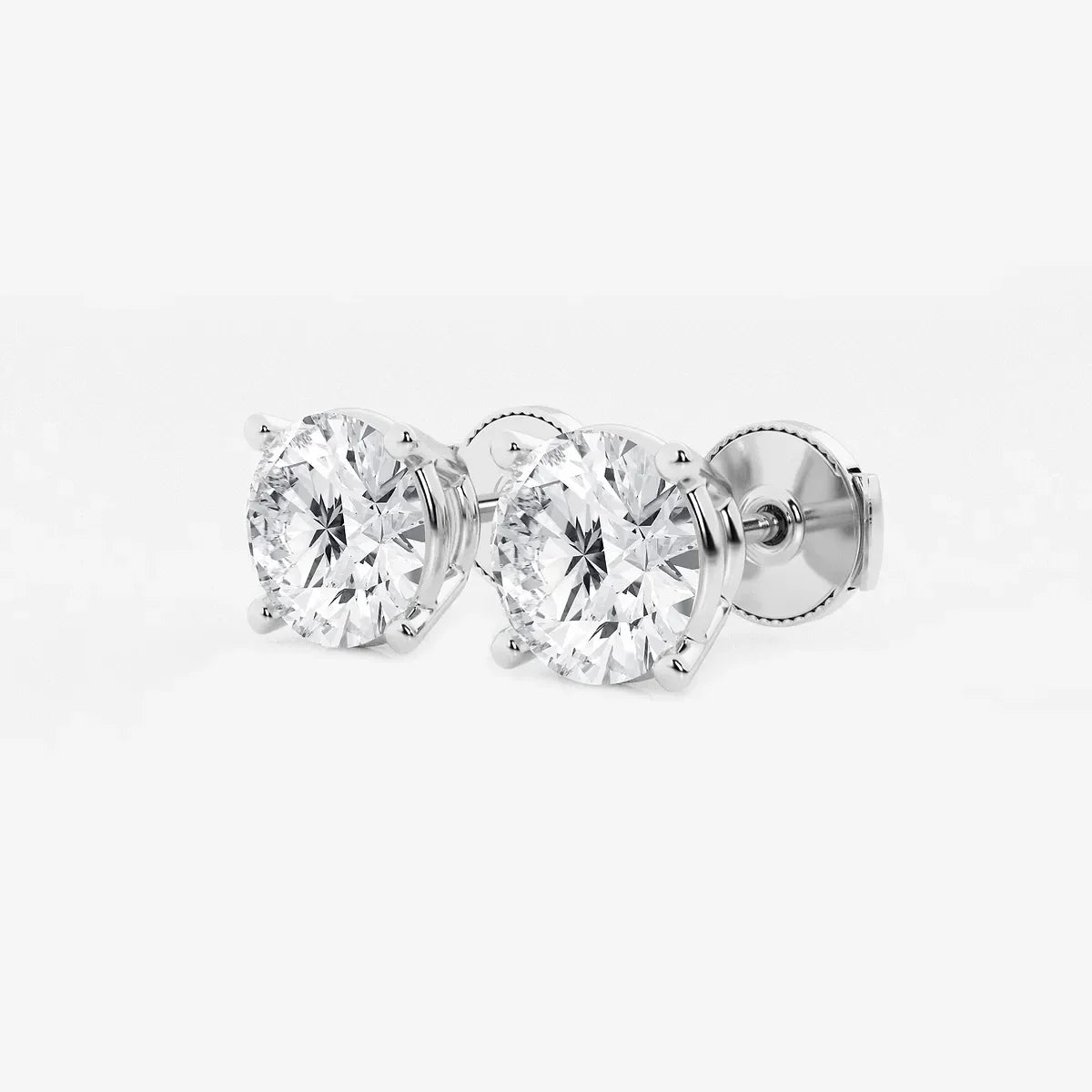 Round lab grown diamond stud earrings in white gold setting, Delux Jewelry