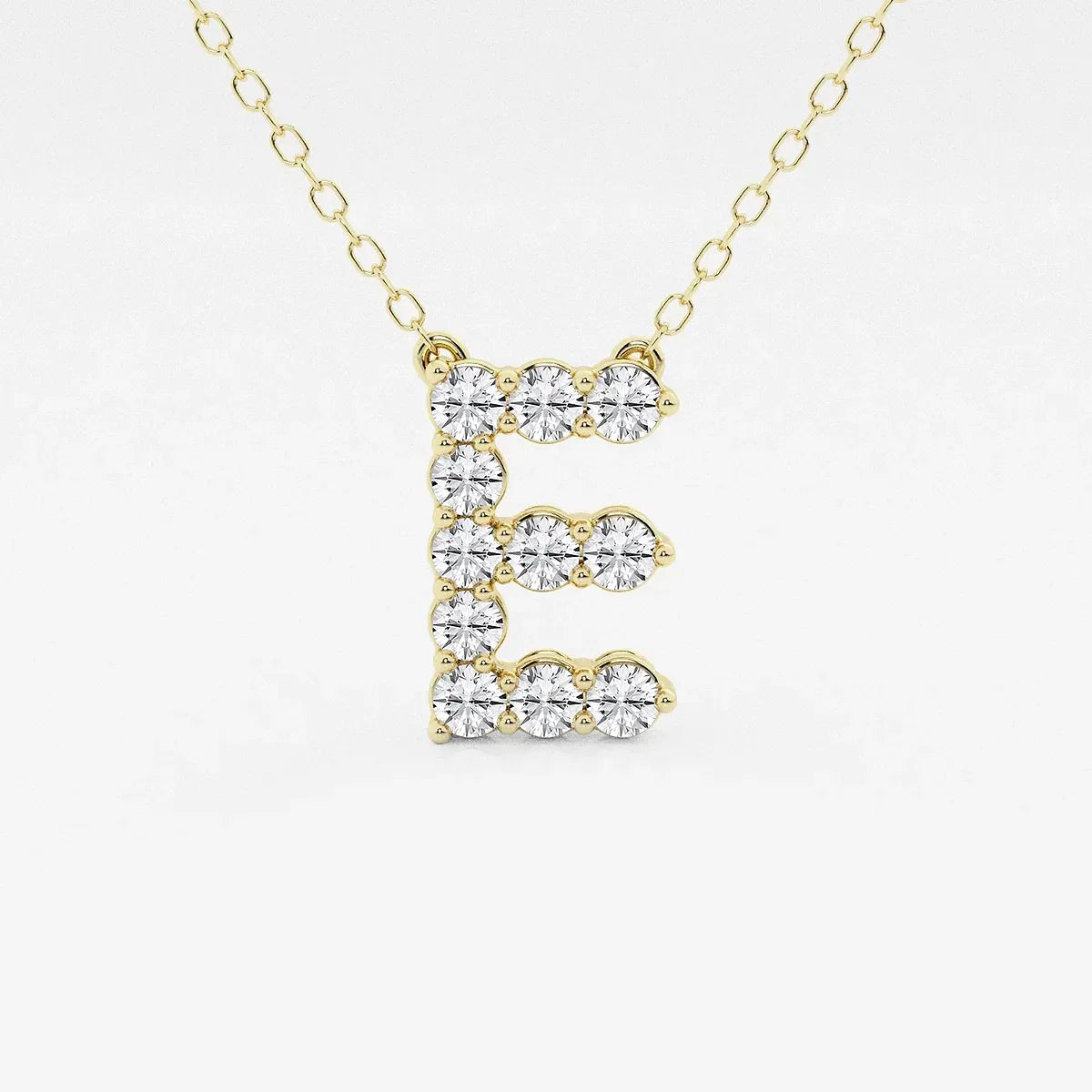 Yellow gold necklace with lab grown diamond E initial pendant from Delux Jewelry