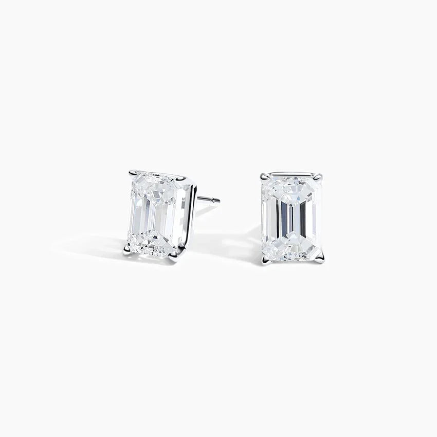 Emerald lab diamond stud earrings in 14K white gold by Delux Jewelry on white background