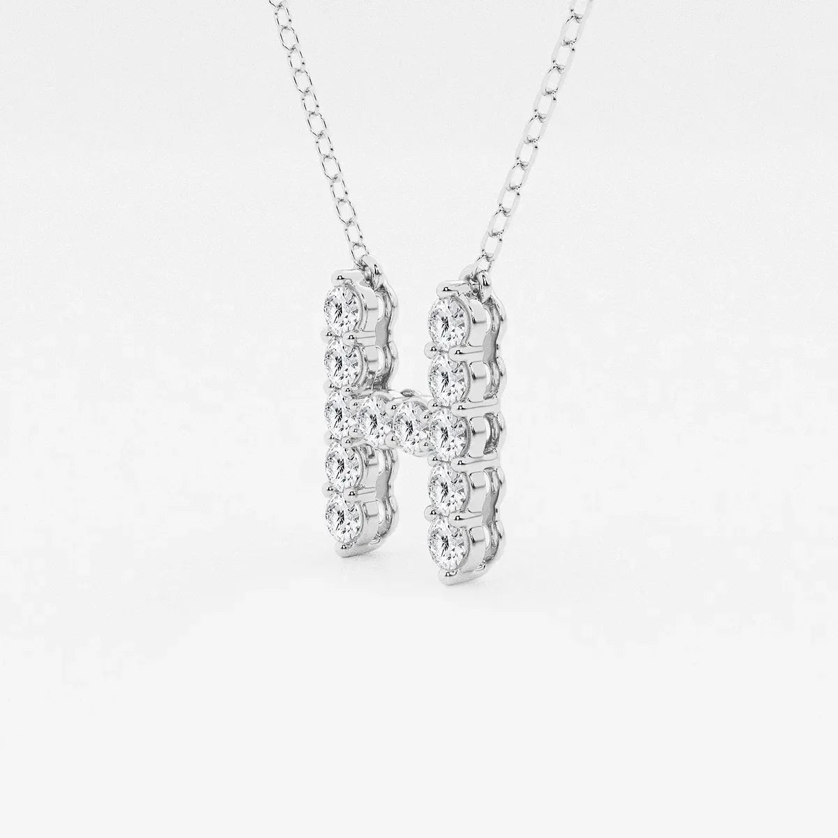 White gold letter H pendant necklace with lab grown diamonds by Delux Jewelry