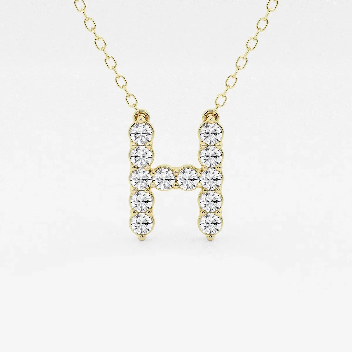 Yellow gold necklace with lab grown diamond initial H pendant from Delux Jewelry