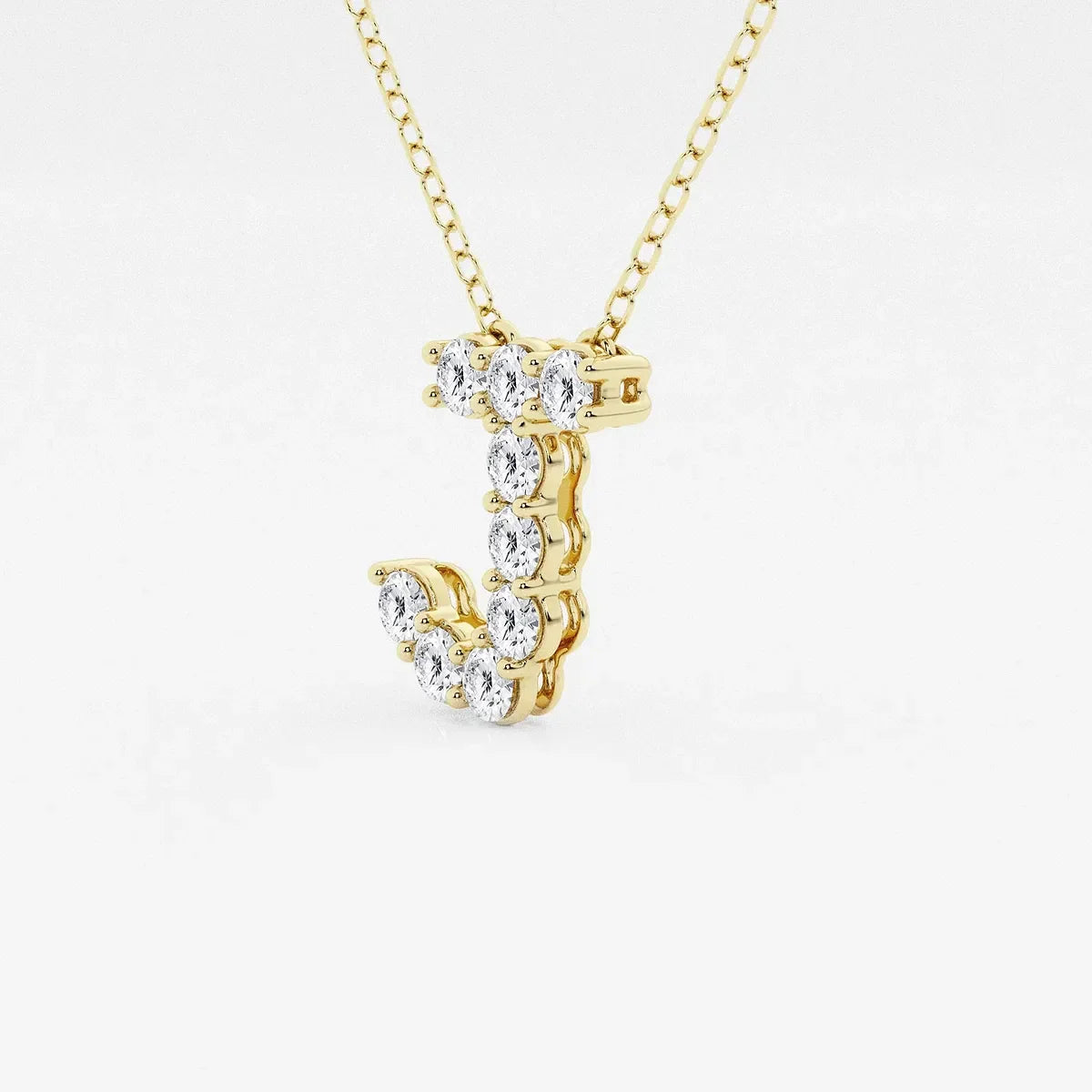 Gold necklace with diamond letter J pendant from Delux Jewelry