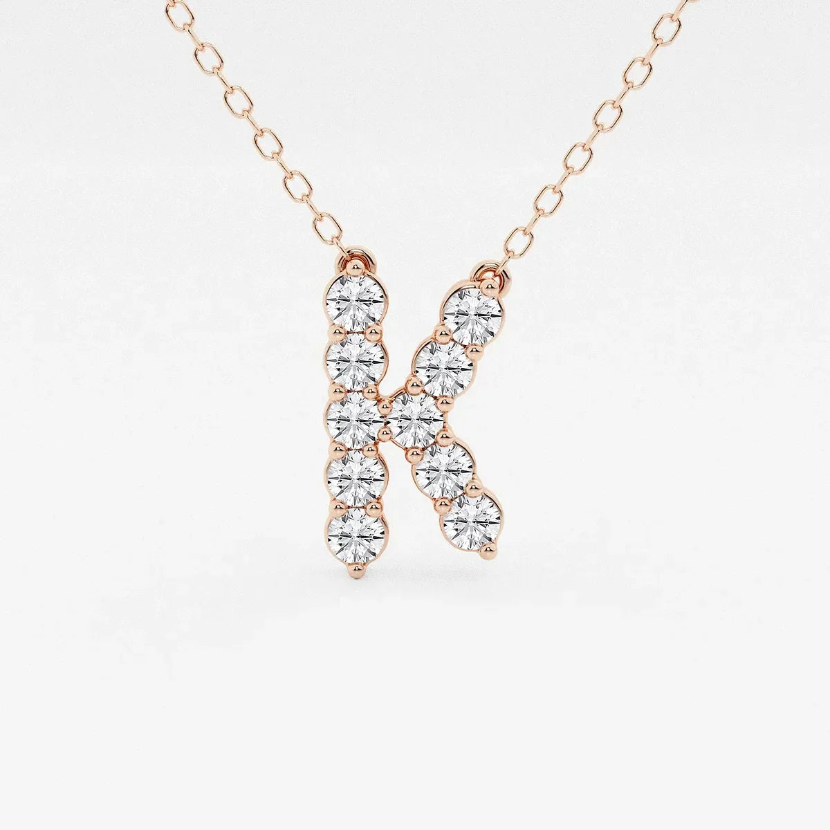 Rose gold pendant necklace with diamond letter K, Delux Jewelry lab grown diamond jewelry.