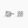 Lab diamond stud earrings in 14K white gold by Delux Jewelry on white background