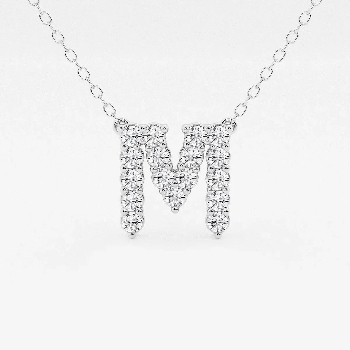 White gold lab grown diamond M initial pendant necklace by Delux Jewelry