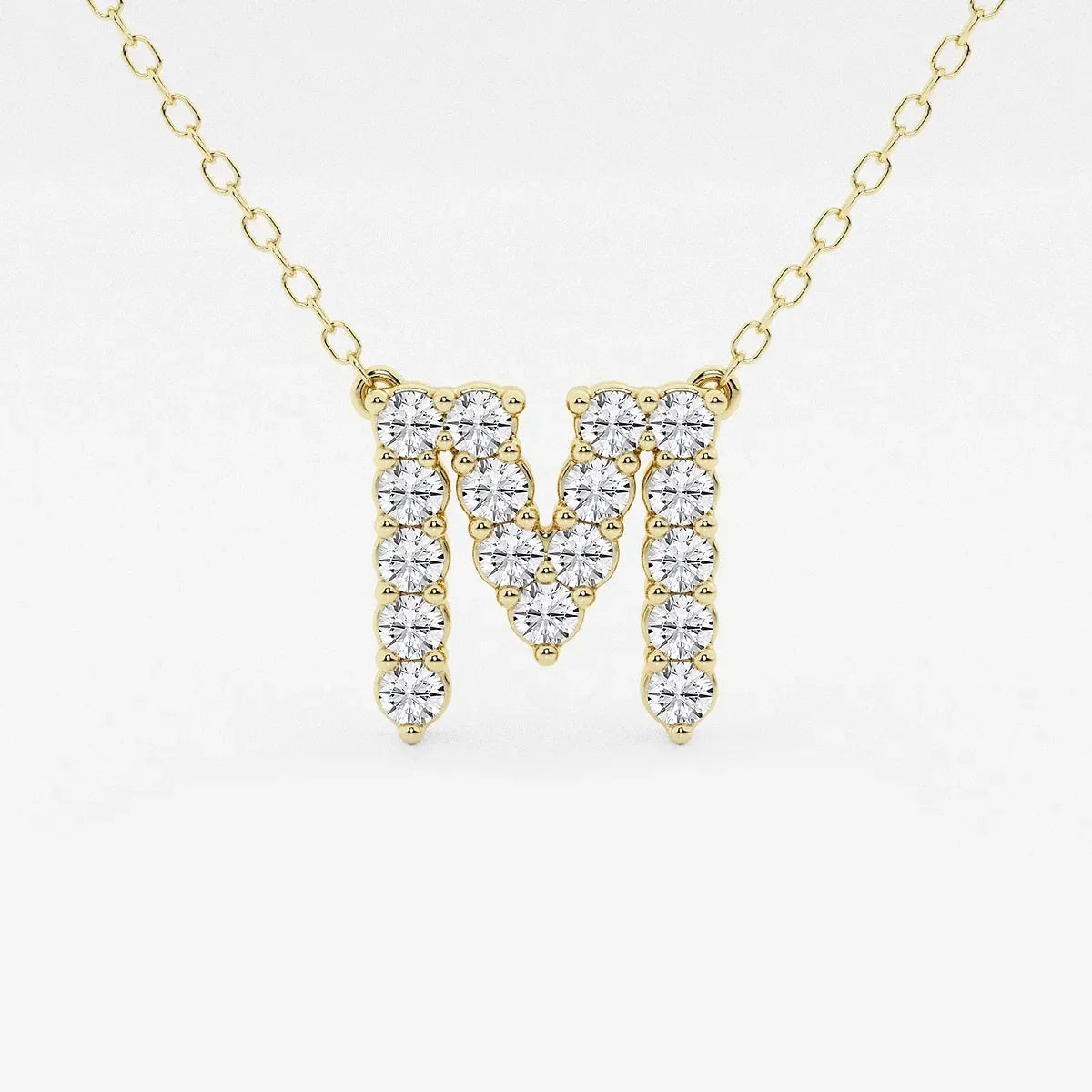 Gold necklace with lab grown diamond M initial pendant from Delux Jewelry