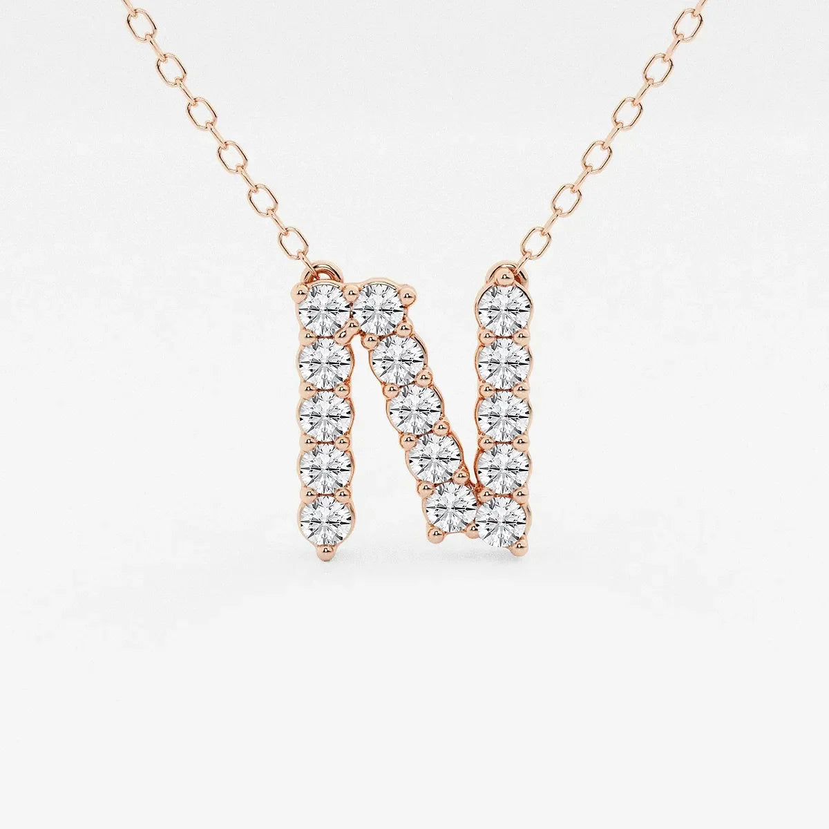 Rose gold necklace with lab grown diamond N initial pendant from Delux Jewelry