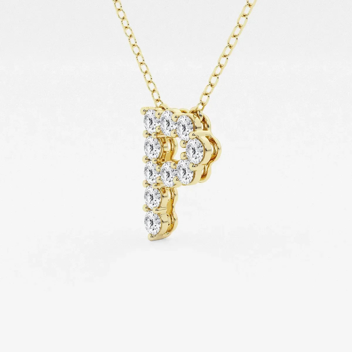 Gold necklace with letter P pendant featuring lab grown diamonds from Delux Jewelry