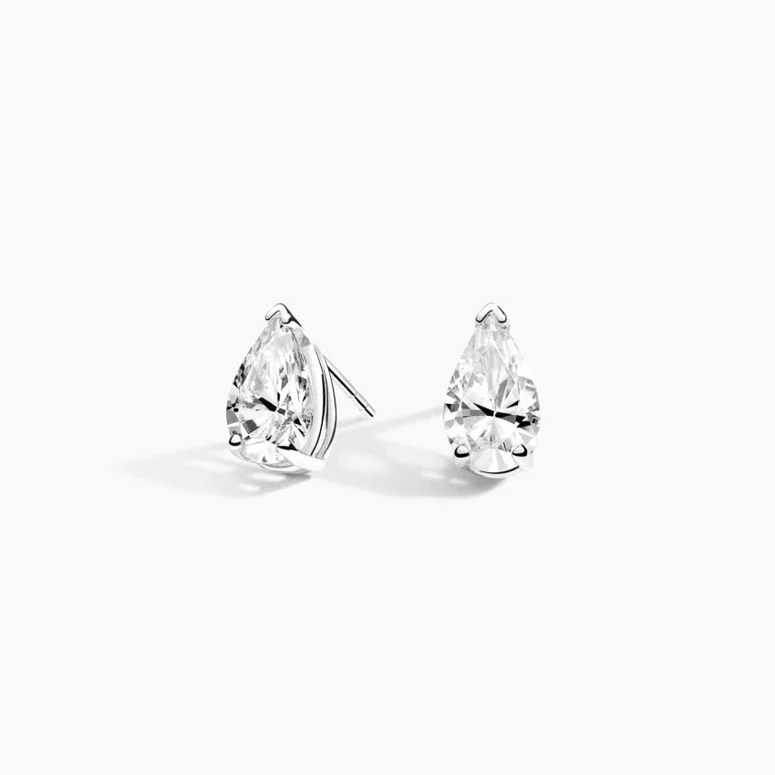 Pear-shaped lab diamond stud earrings in 14K white gold from Delux Jewelry on white background