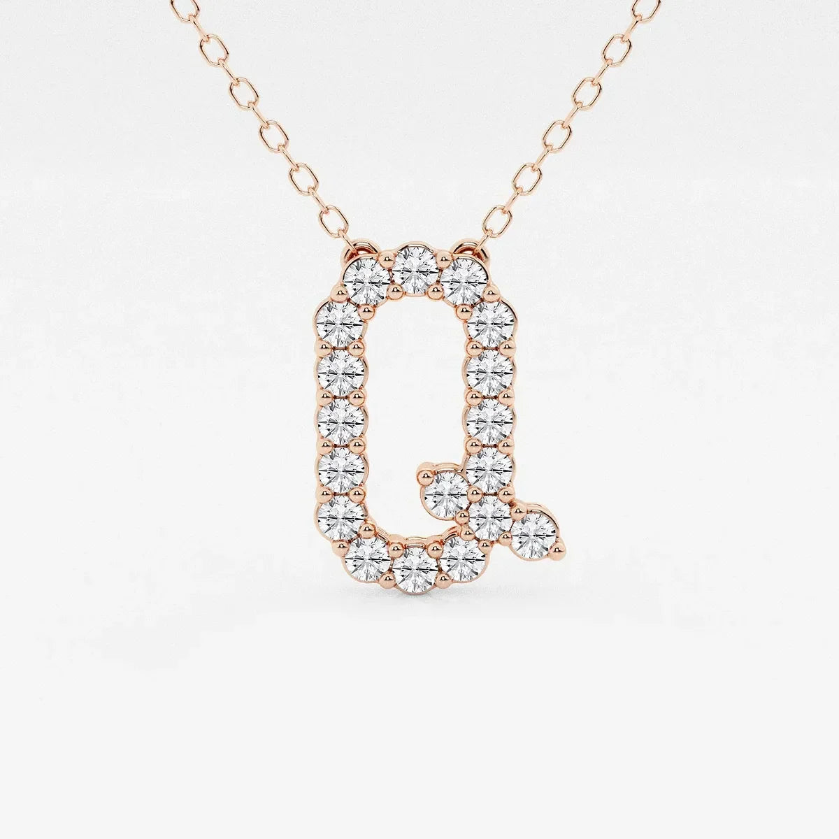 Rose gold pendant necklace with letter Q, set with lab grown diamonds from Delux Jewelry