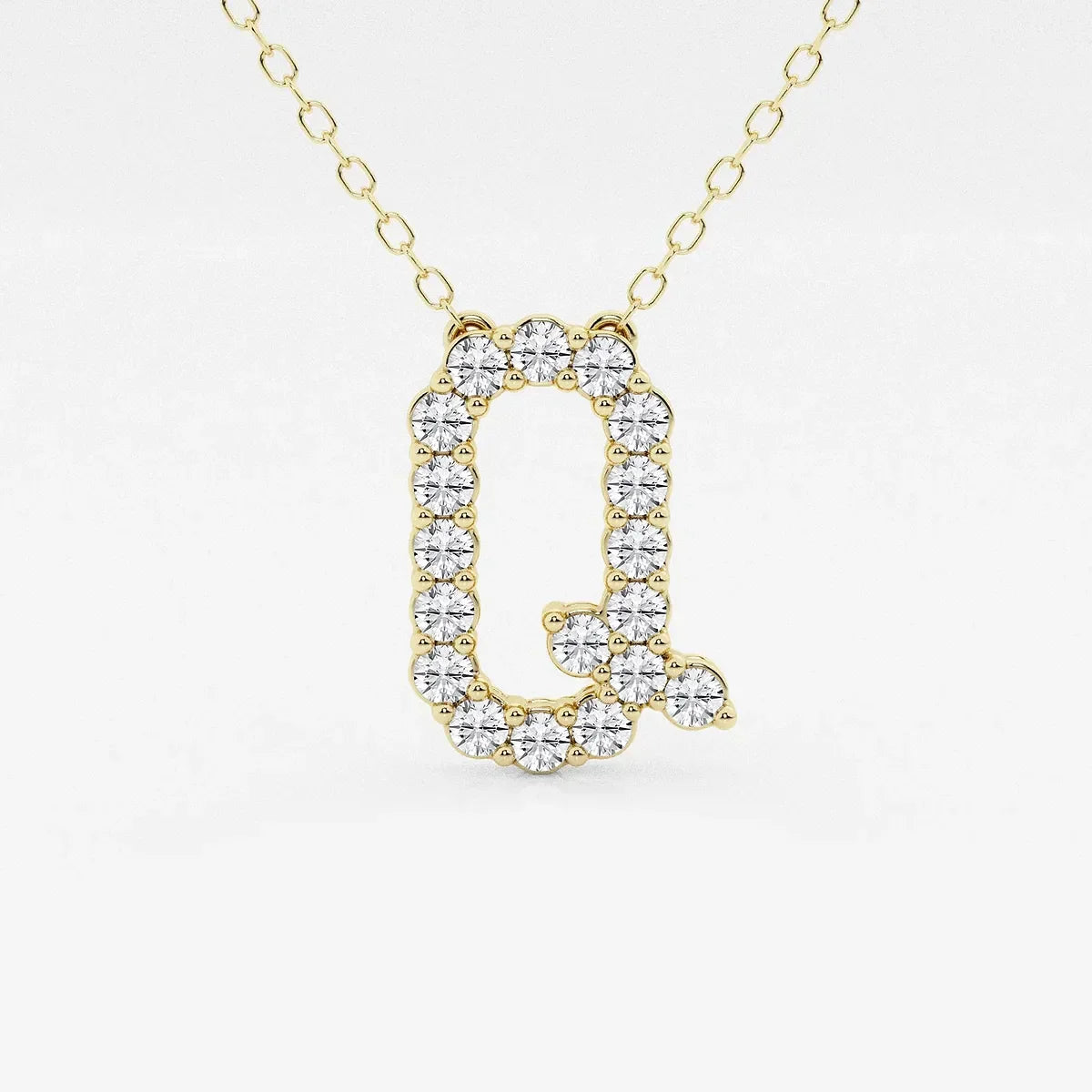 Yellow gold necklace with lab grown diamond Q initial pendant from Delux Jewelry