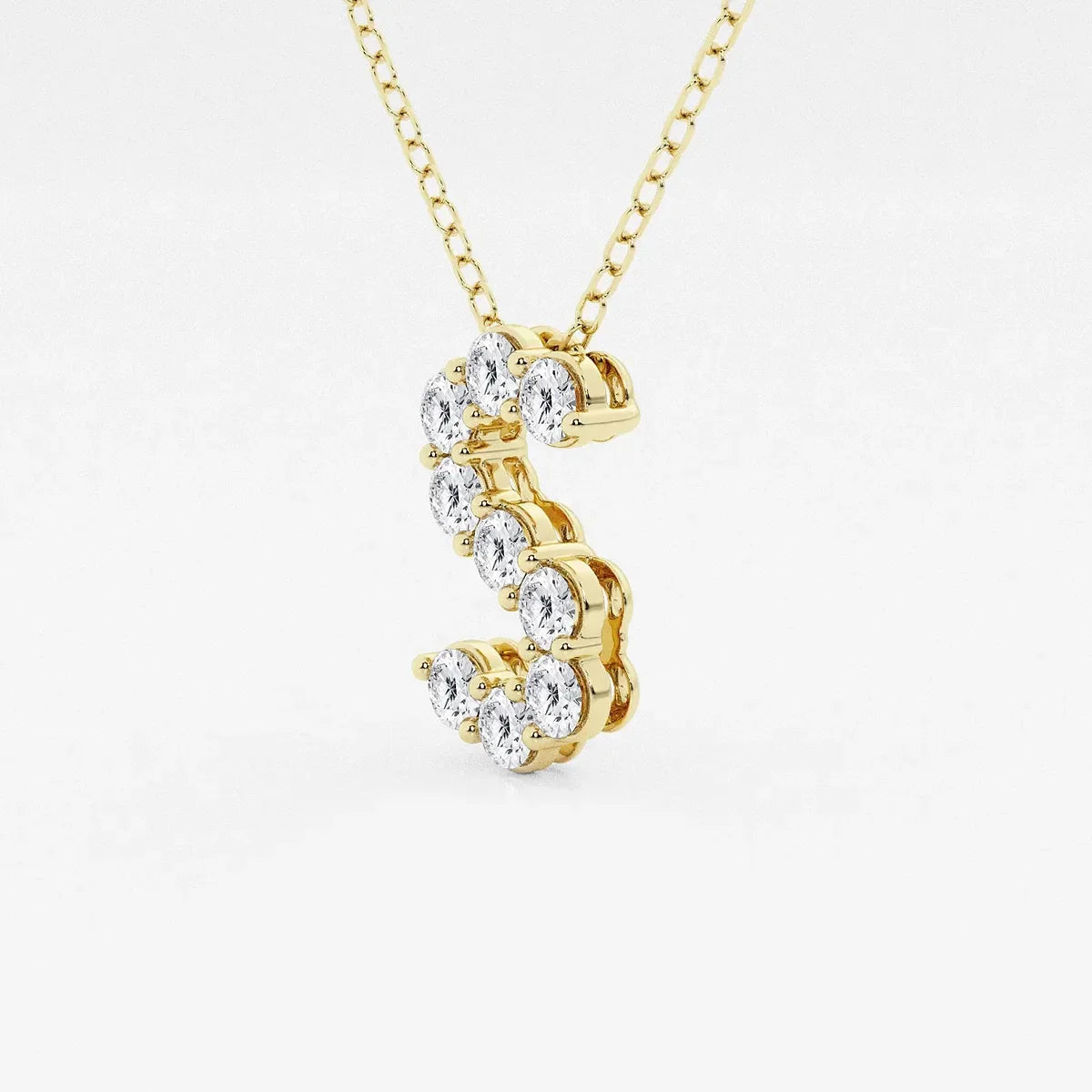 Gold S initial pendant necklace with lab grown diamonds by DELUX JEWELRY on white background