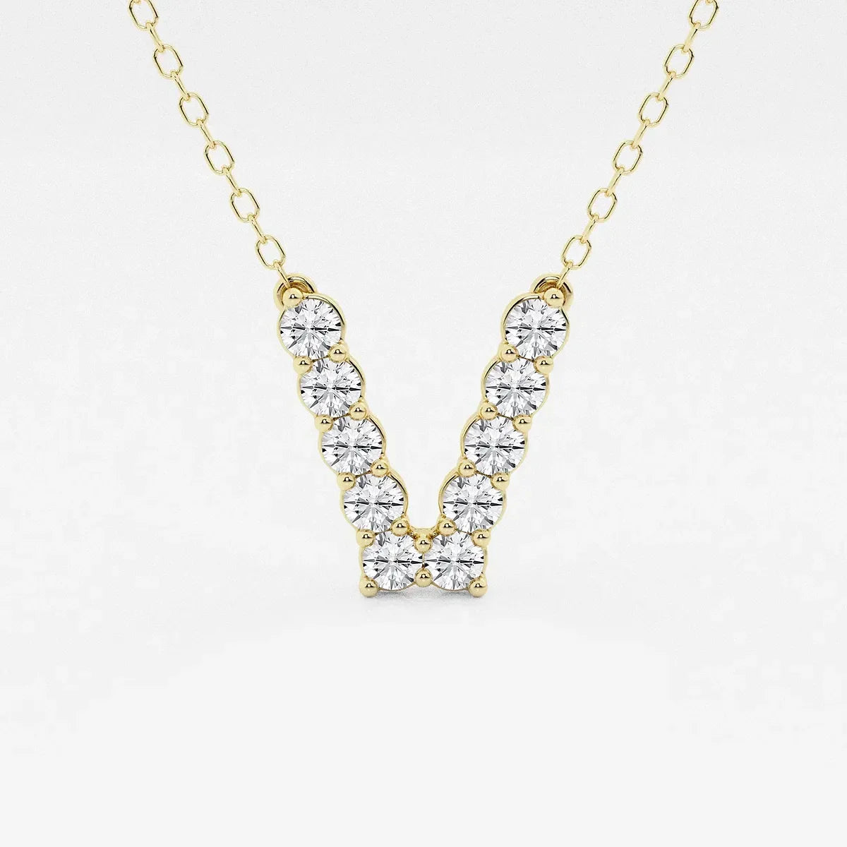 Yellow gold V pendant necklace with lab grown diamonds from Delux Jewelry