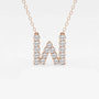 Rose gold necklace with lab grown diamond W initial pendant on a white background