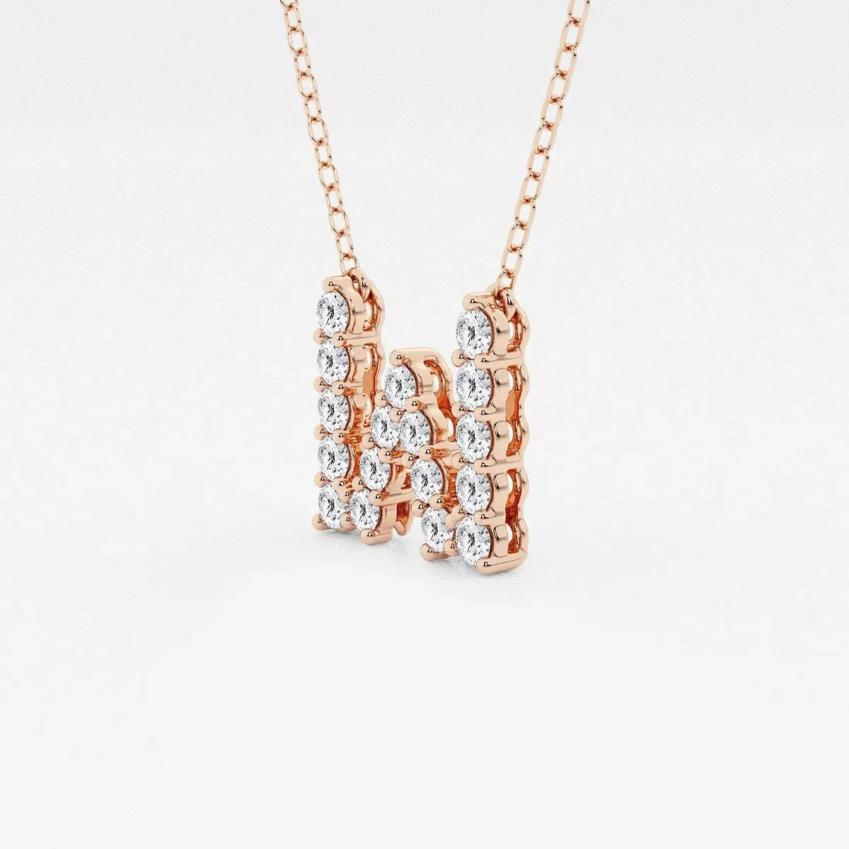 Rose gold necklace with lab grown diamond initial pendant from Delux Jewelry