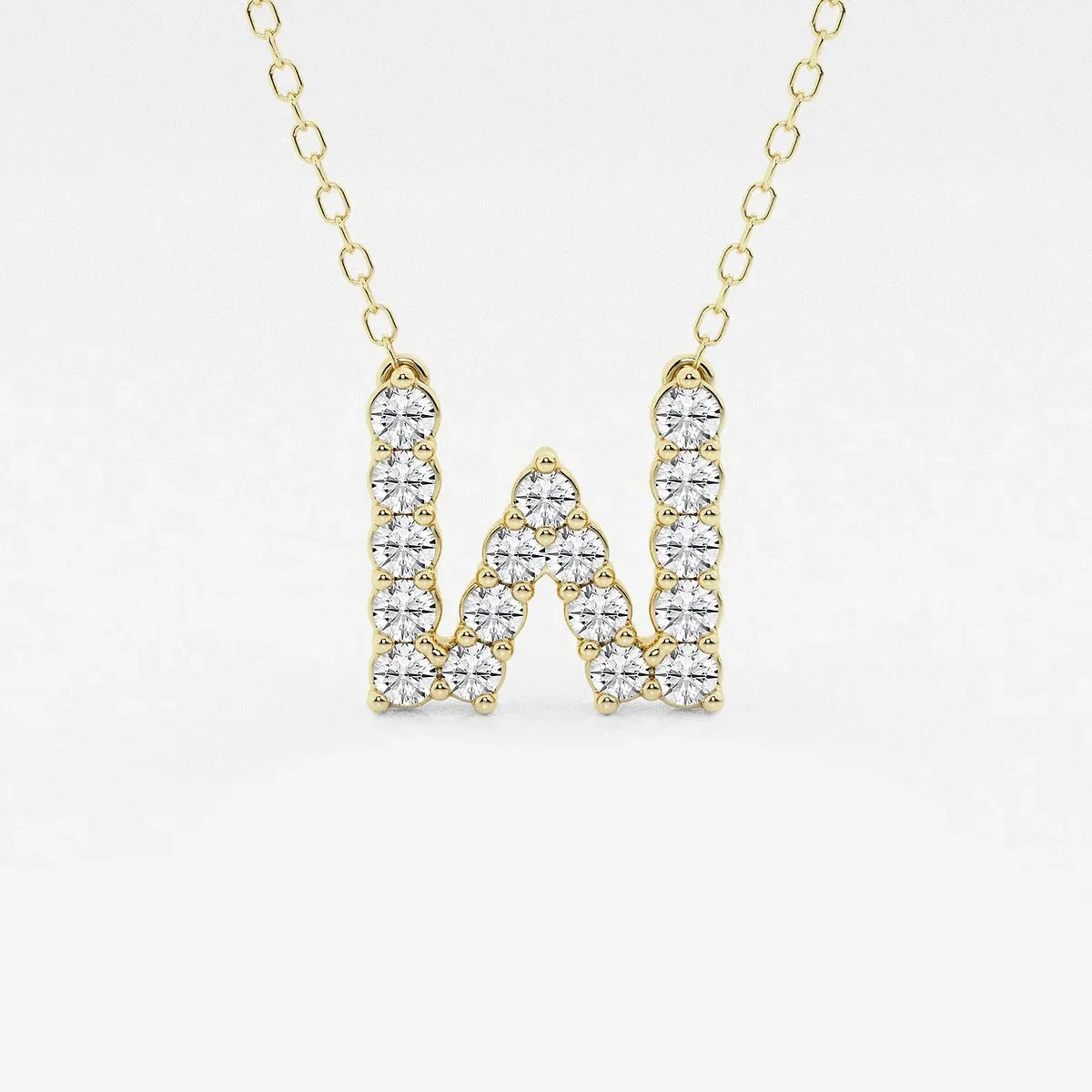 Gold necklace with W-shaped pendant adorned with lab grown diamonds from Delux Jewelry