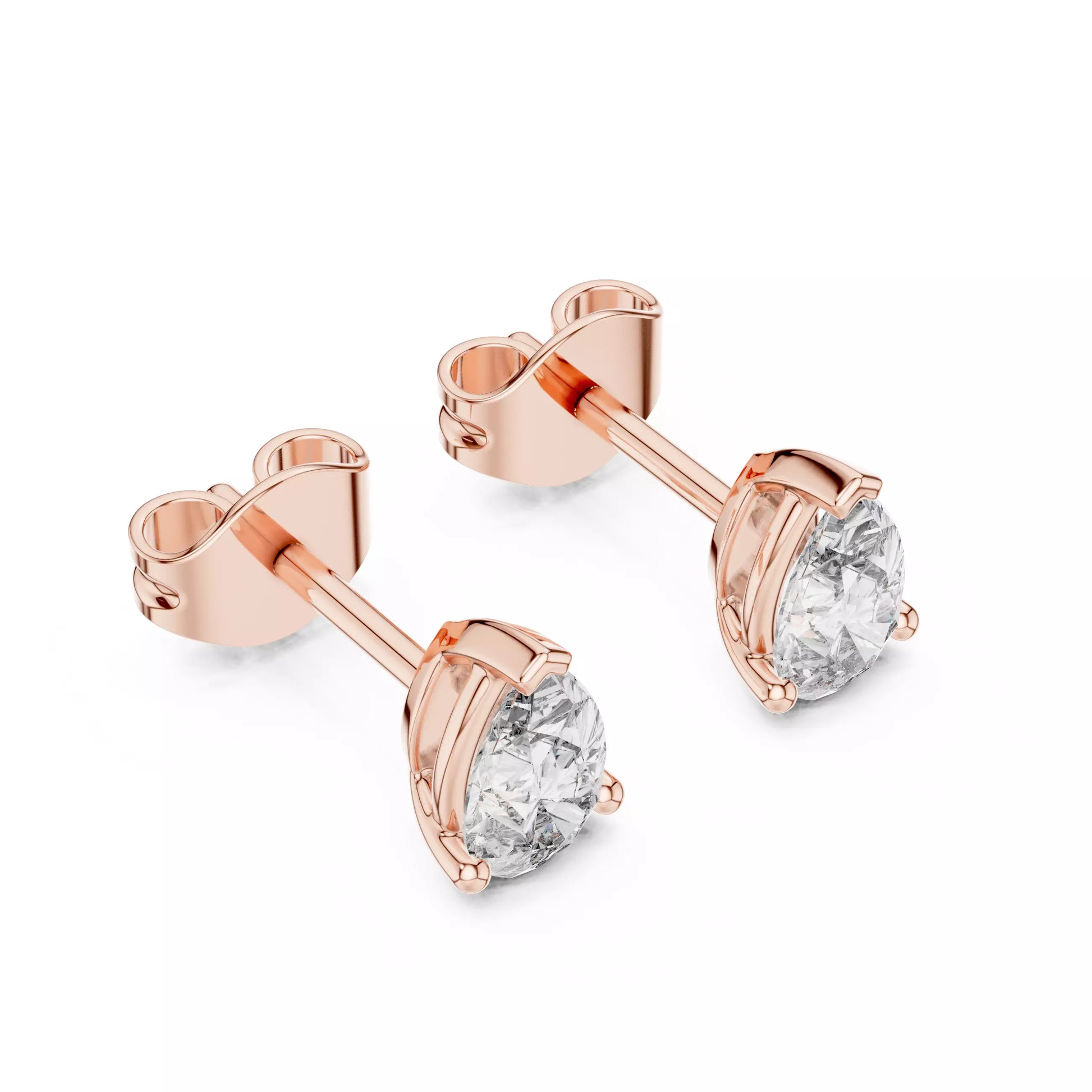 Solitaire Pear Cut Diamond Stud Earrings